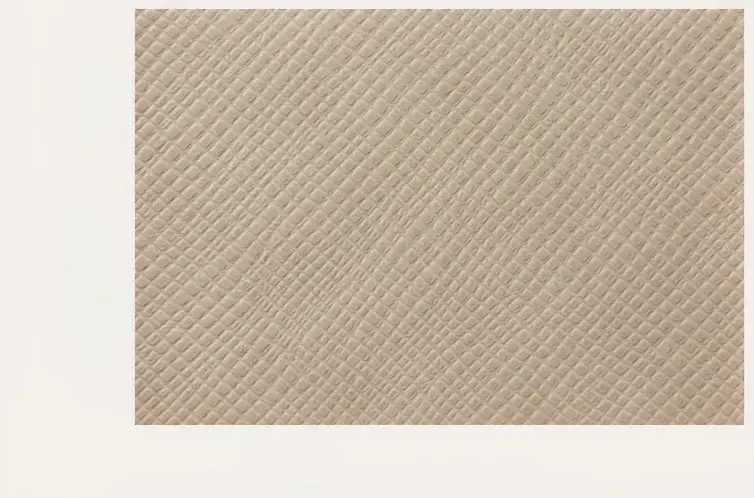 OEM handbag interior lining construction with pocket layout, woven label and seam finishing detail